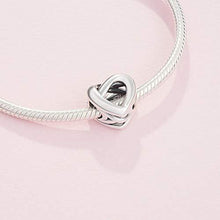 
                        
                          Muat gambar ke penampil Galeri, Pandora Jewelry Knotted Heart Sterling Silver Charm - JOY2ESpree
                        
                      