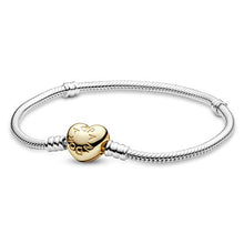 
                        
                          Load image into Gallery viewer, Pandora Jewelry Moments Heart Clasp Snake Chain Pandora Shine and Sterling Silver Bracelet - JOY2ESpree
                        
                      