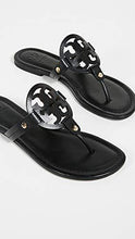 
                        
                          將圖片載入圖庫檢視器 Tory Burch Women's Miller Leather Laser Cut T-Strap Thong Sandal - JOY2ESpree
                        
                      
