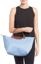 
                        
                          Load image into Gallery viewer, LONGCHAMP Medium Le Pliage Nylon Top Handle Tote, Blue Mist (Brume)
                        
                      