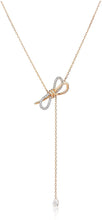 
                        
                          Load image into Gallery viewer, SWAROVSKI Women's Lifelong Bow Jewelry Collection, Clear Crystals - JOY2ESpree
                        
                      