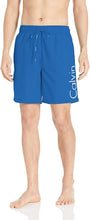 
                        
                          Cargar imagen en el visor de la galería, Calvin Klein Men's 7 Inch Elastic Waist Quick Dry Swim Trunk
                        
                      