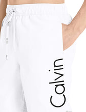 
                        
                          Cargar imagen en el visor de la galería, Calvin Klein Men's 7 Inch Elastic Waist Quick Dry Swim Trunk
                        
                      