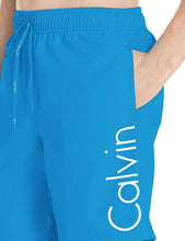 
                        
                          Cargar imagen en el visor de la galería, Calvin Klein Men's 7 Inch Elastic Waist Quick Dry Swim Trunk
                        
                      