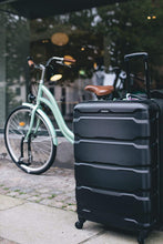 
                        
                          Load image into Gallery viewer, Samsonite Omni PC Hardside Expandable Luggage with Spinner Wheels, Black, Carry-On 20-Inch
                        
                      
