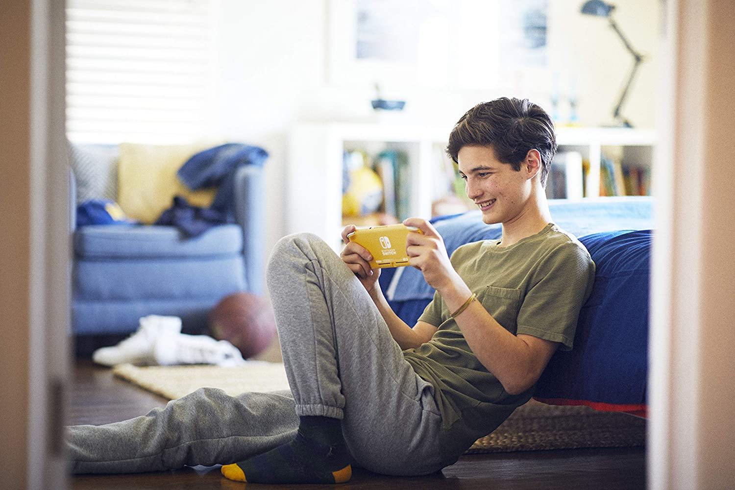 Nintendo Switch Lite - Coral with SanDisk 128GB MicroSDXC UHS-I Card for Nintendo Switch - JOY2ESpree
