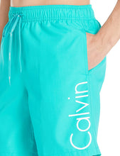 
                        
                          Cargar imagen en el visor de la galería, Calvin Klein Men's 7 Inch Elastic Waist Quick Dry Swim Trunk
                        
                      
