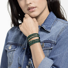 
                        
                          Cargar imagen en el visor de la galería, SWAROVSKI Women's Leather Look Crystal Power Bracelet Collection - JOY2ESpree
                        
                      