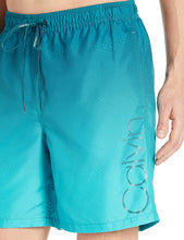 
                        
                          Cargar imagen en el visor de la galería, Calvin Klein Men's 7 Inch Elastic Waist Quick Dry Swim Trunk
                        
                      