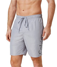 
                        
                          Cargar imagen en el visor de la galería, Calvin Klein Men's 7 Inch Elastic Waist Quick Dry Swim Trunk
                        
                      